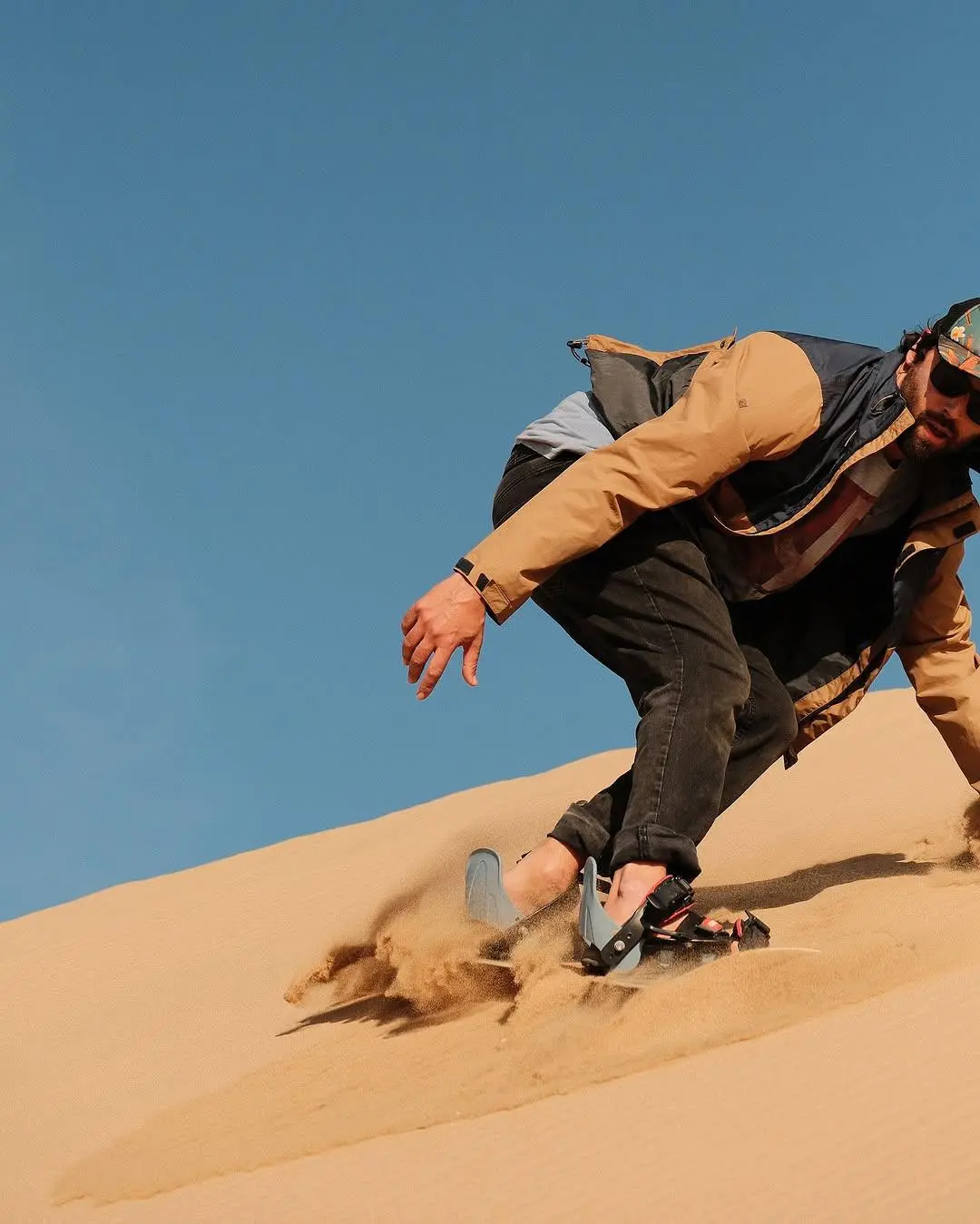 Sandboarding in Timlalin Dunes